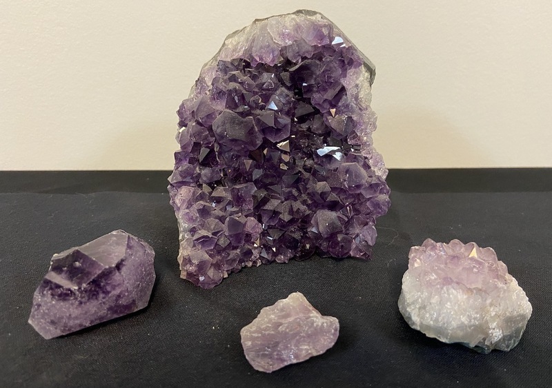 This is a mineral and rock collection gathered from Travis Jackson's personal collection with a variety of specimens presented in their polished and rough forms.