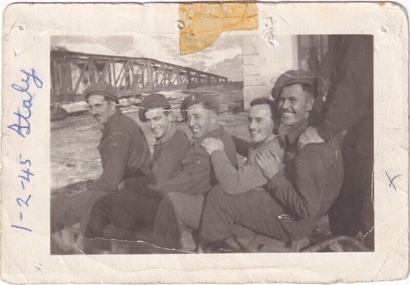 This digital archive gathers photos, letters, newspaper clippings, and other archival material related to W.I. (Bill) Hann's service and experiences during the Second World War. It features photographs taken in Newfoundland, England, Scotland, Algeria, Tunisia, and Italy, letters sent from Newfoundland, England, and Tunisia, and clippings from Newspapers in Newfoundland, Montreal, and Glasgow. Notable archival documents include W.I. (Bill) Hann's diary, a signed menu from a farewell dinner, and a copy of the 166th Newfoundland Field Regiment's despatches, among other interesting documents.